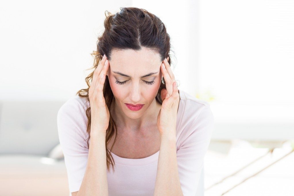 woman having a migraine