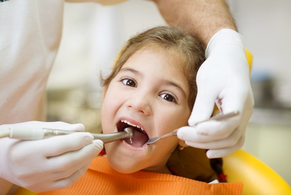 Little girl having a dentist appointment