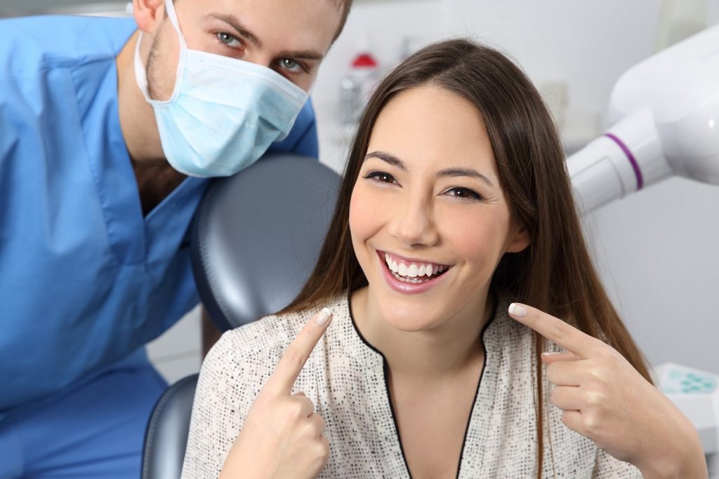 dentist and happy patient