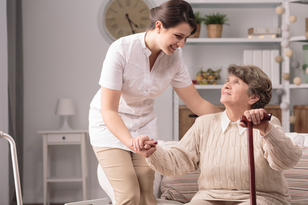 elderly woman and her nurse