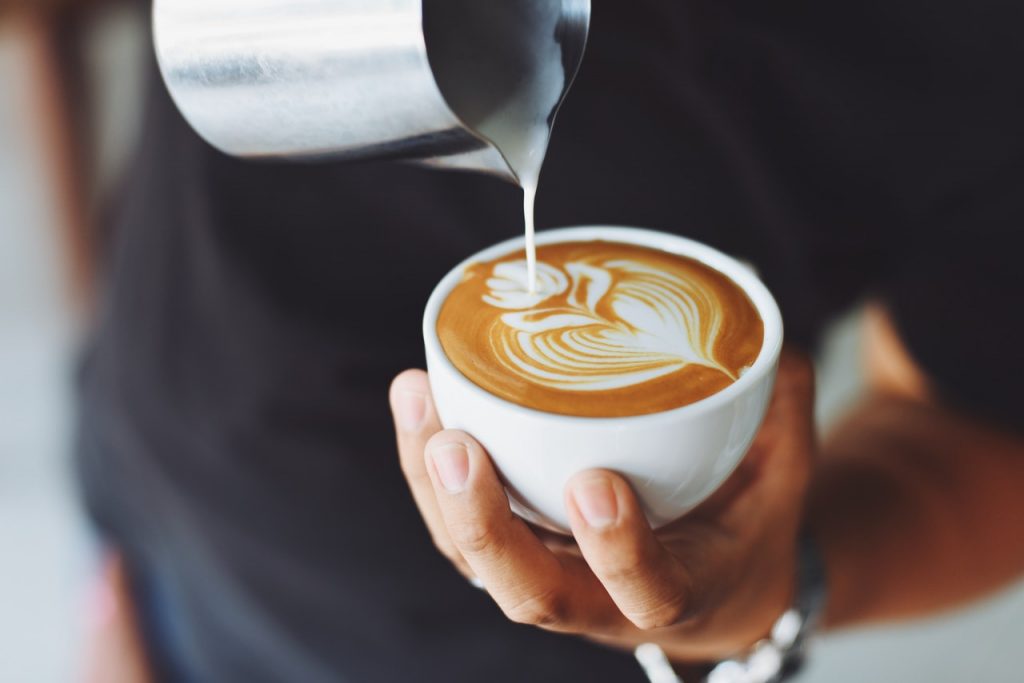 man making coffee